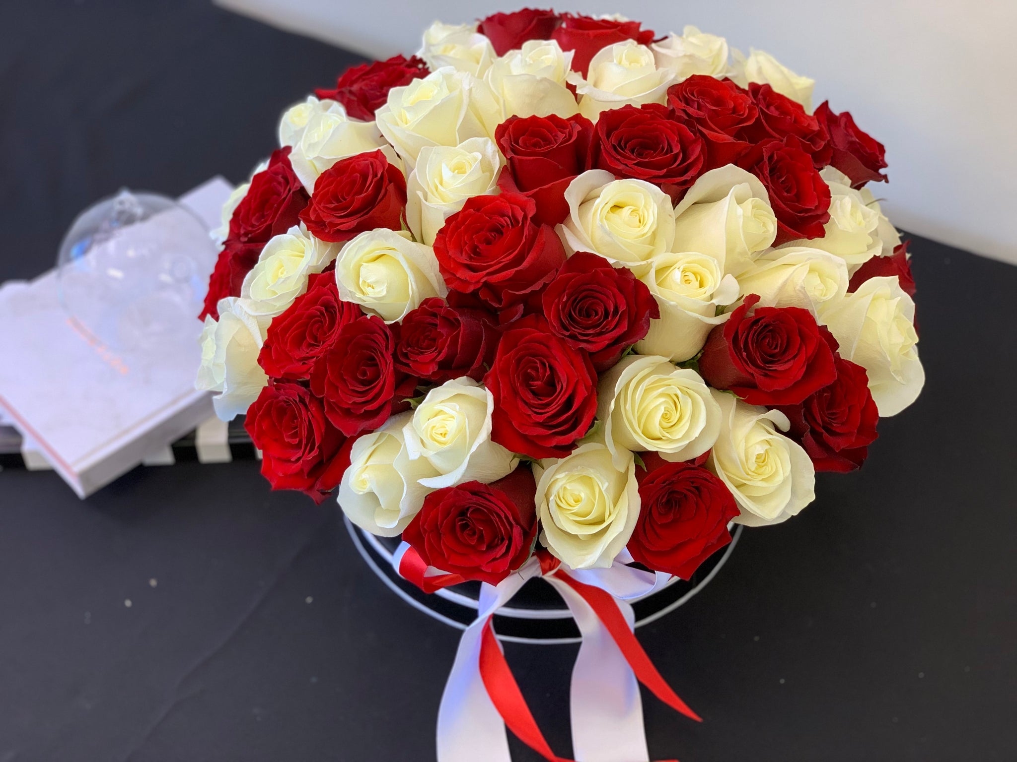 Romantic red and white rose box handcrafted by Luxury Flowers Miami