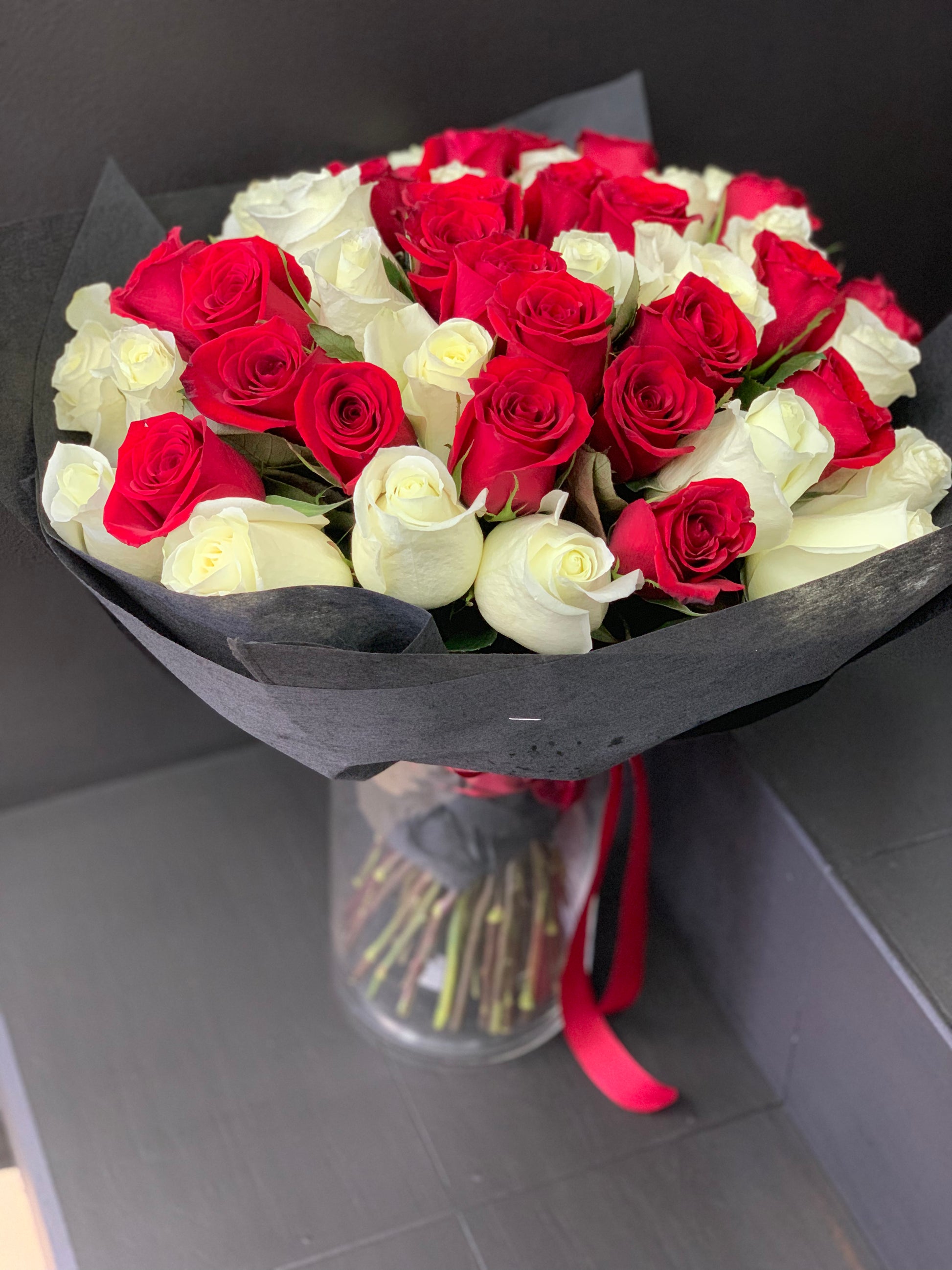 Romantic red and white roses arrangement for Miami flower delivery