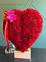 Romantic red rose heart arrangement with Phalaenopsis orchid