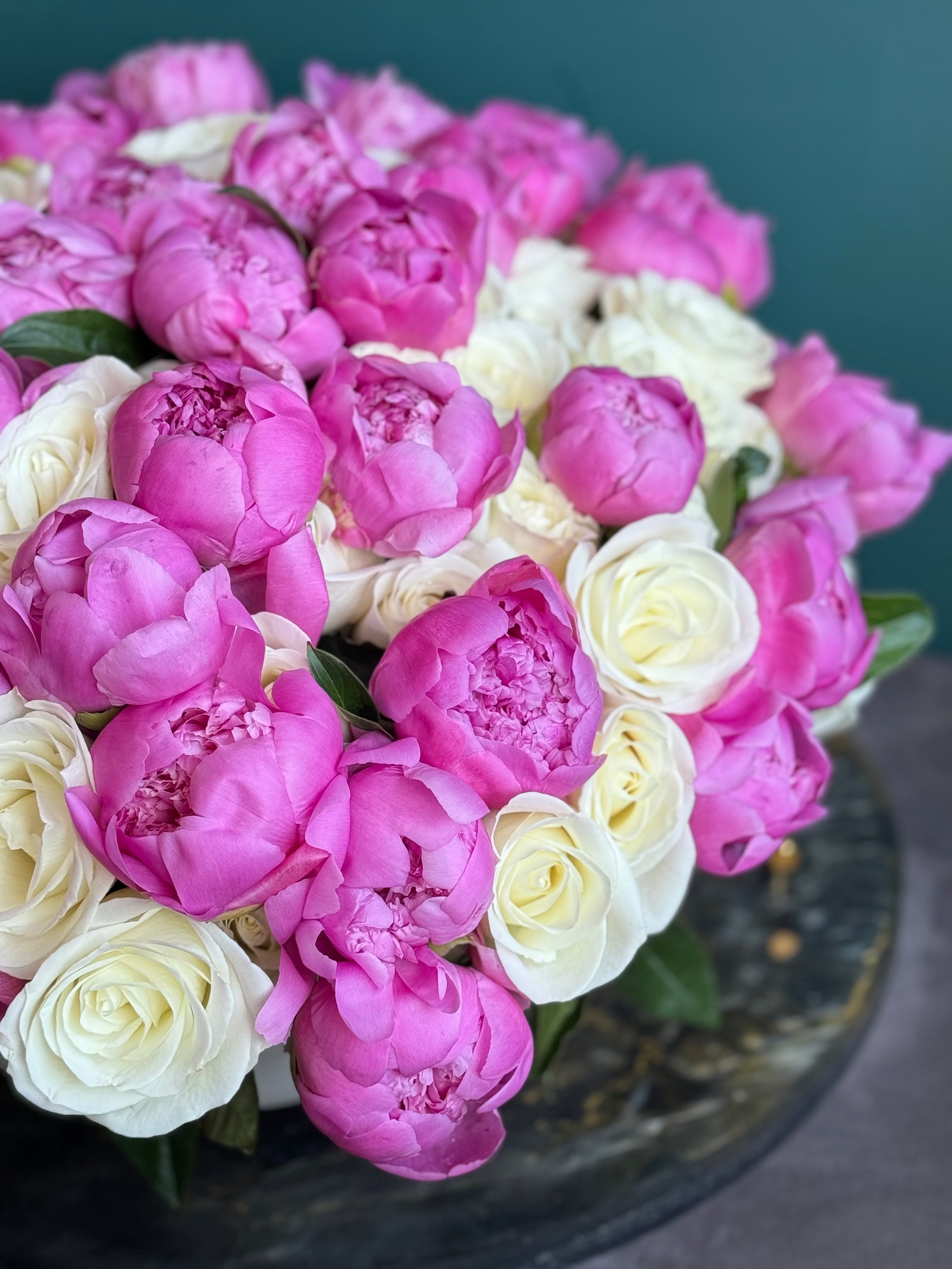 Soft blush and ivory floral arrangement handcrafted by Luxury Flowers Miami