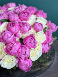 Soft blush and ivory floral arrangement handcrafted by Luxury Flowers Miami