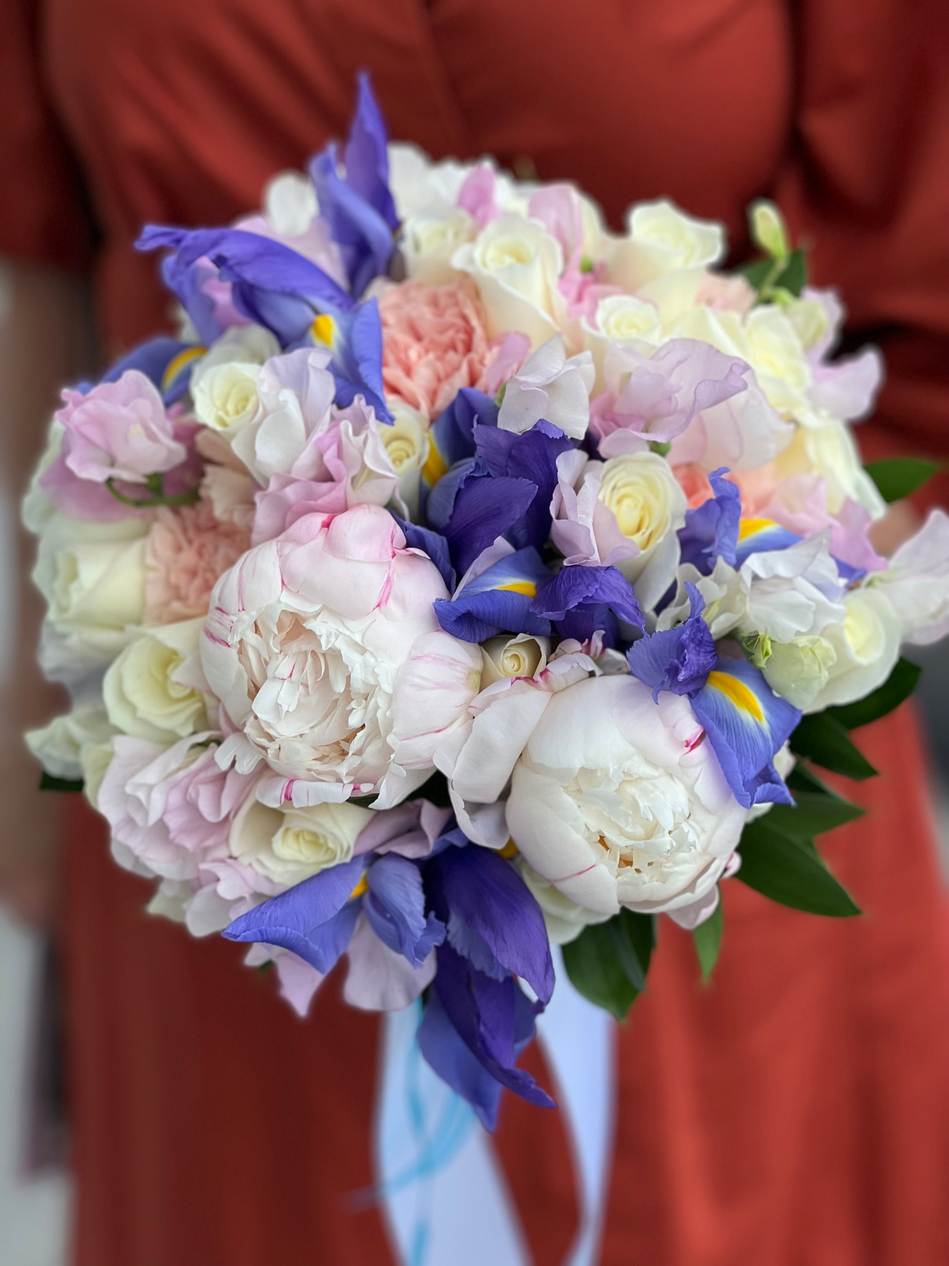 Something blue bridal bouquet with blue iris and romantic pink flowers