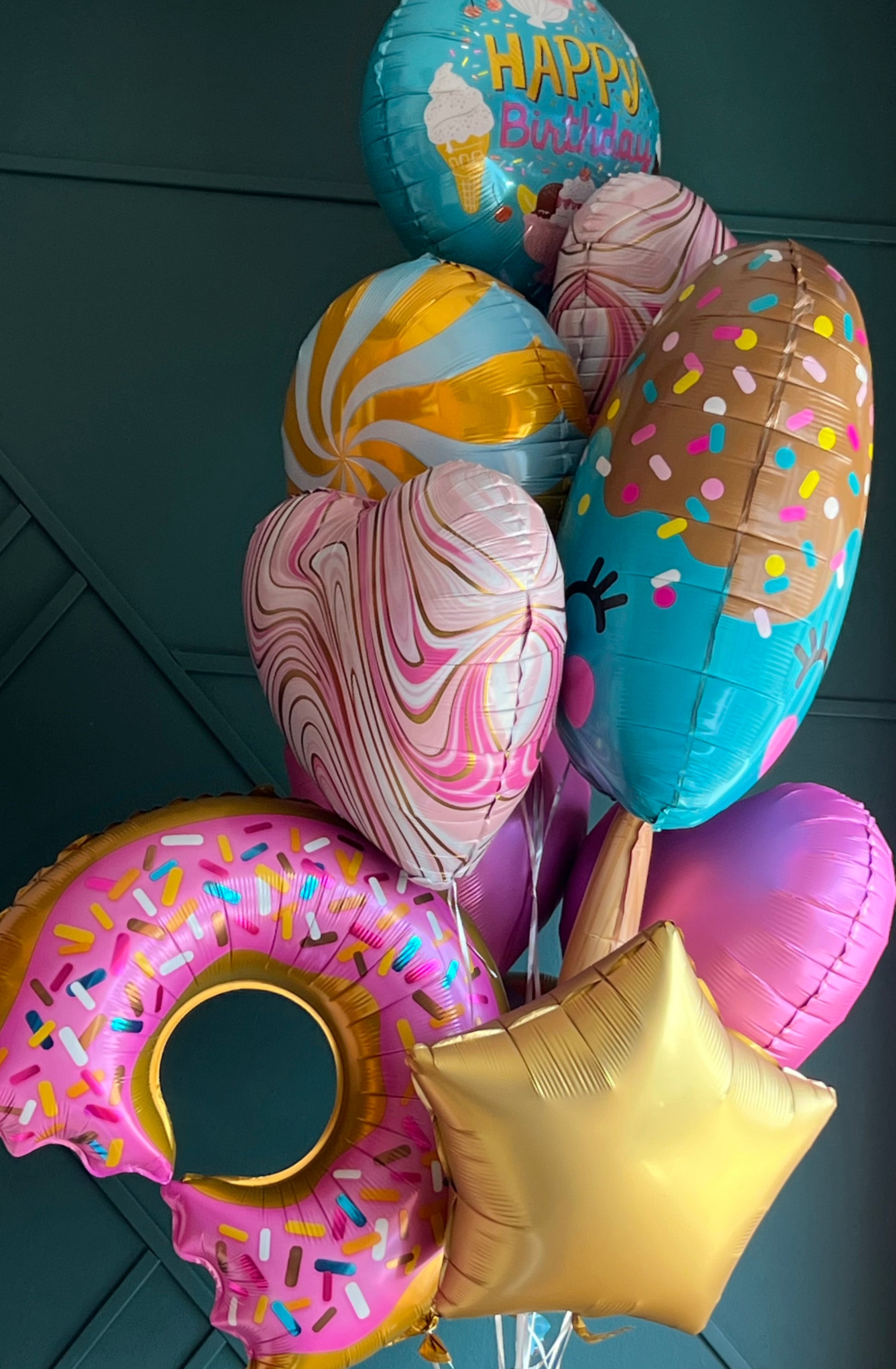 Sweet candy themed balloons arranged by Luxury Flowers Miami
