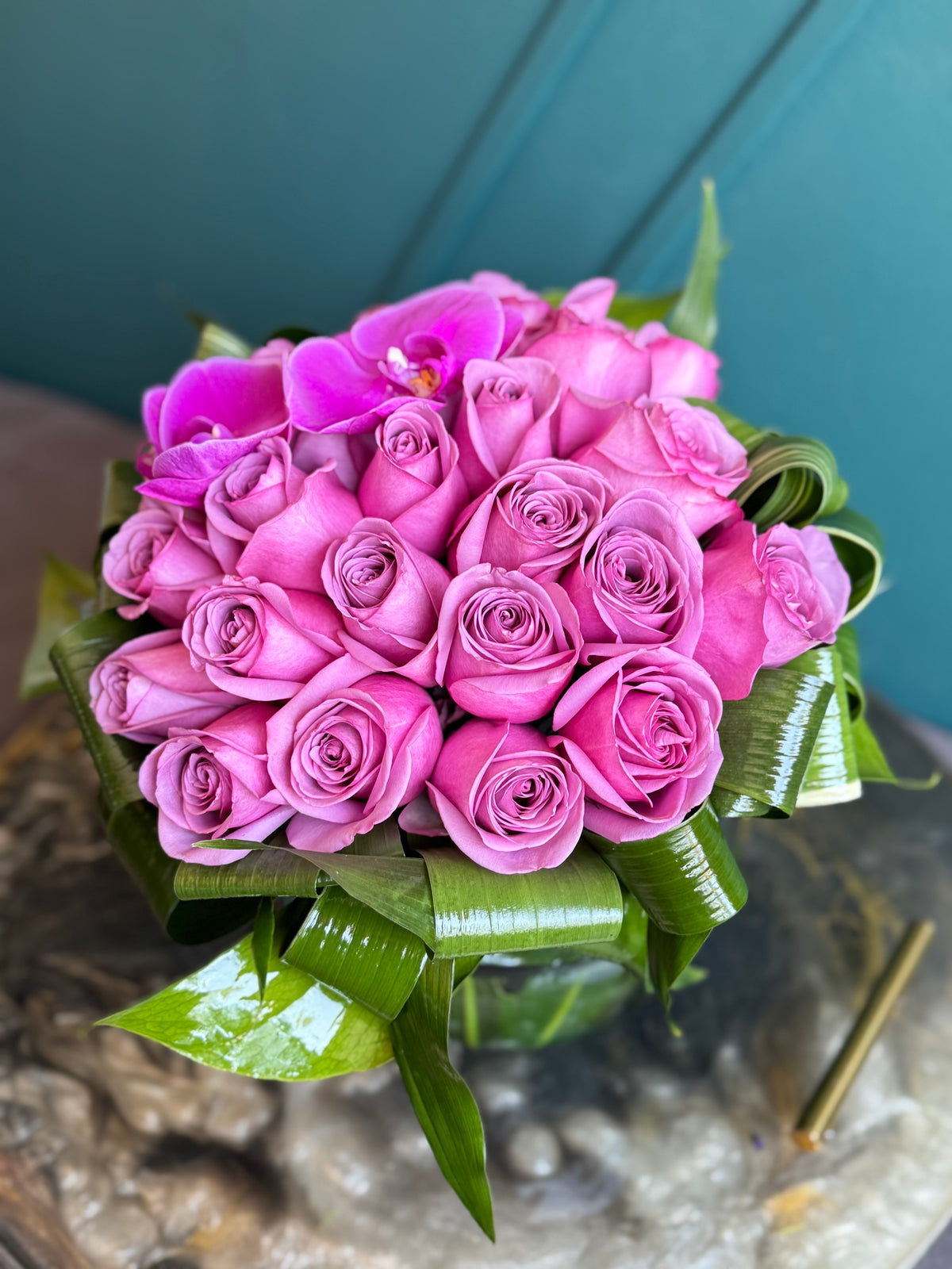 Two dozen lavender roses in modern glass vase Miami