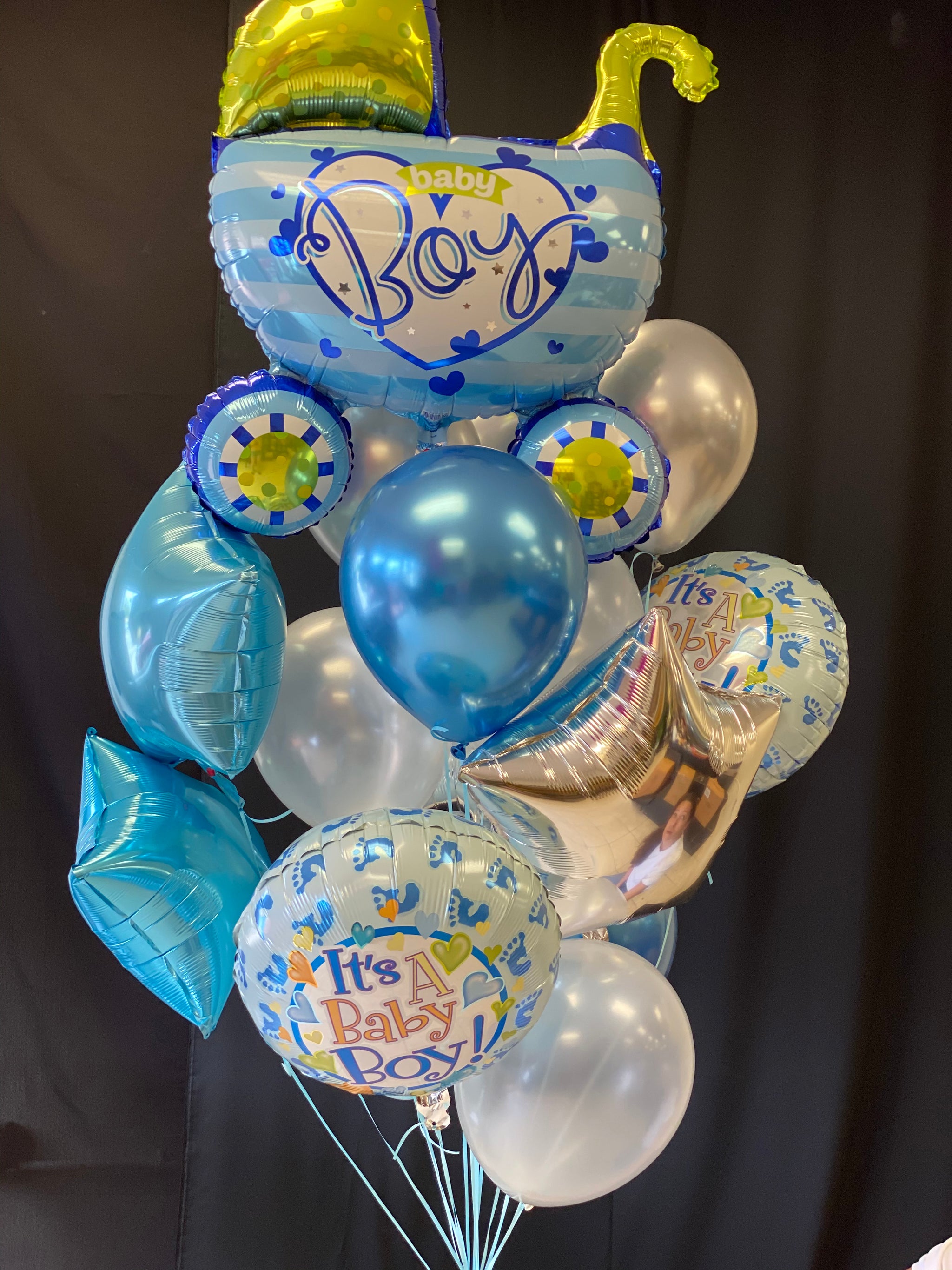 Welcome baby balloon bouquet in blue white and metallic tones