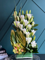 White lily and cymbidium orchid arrangement in Miami