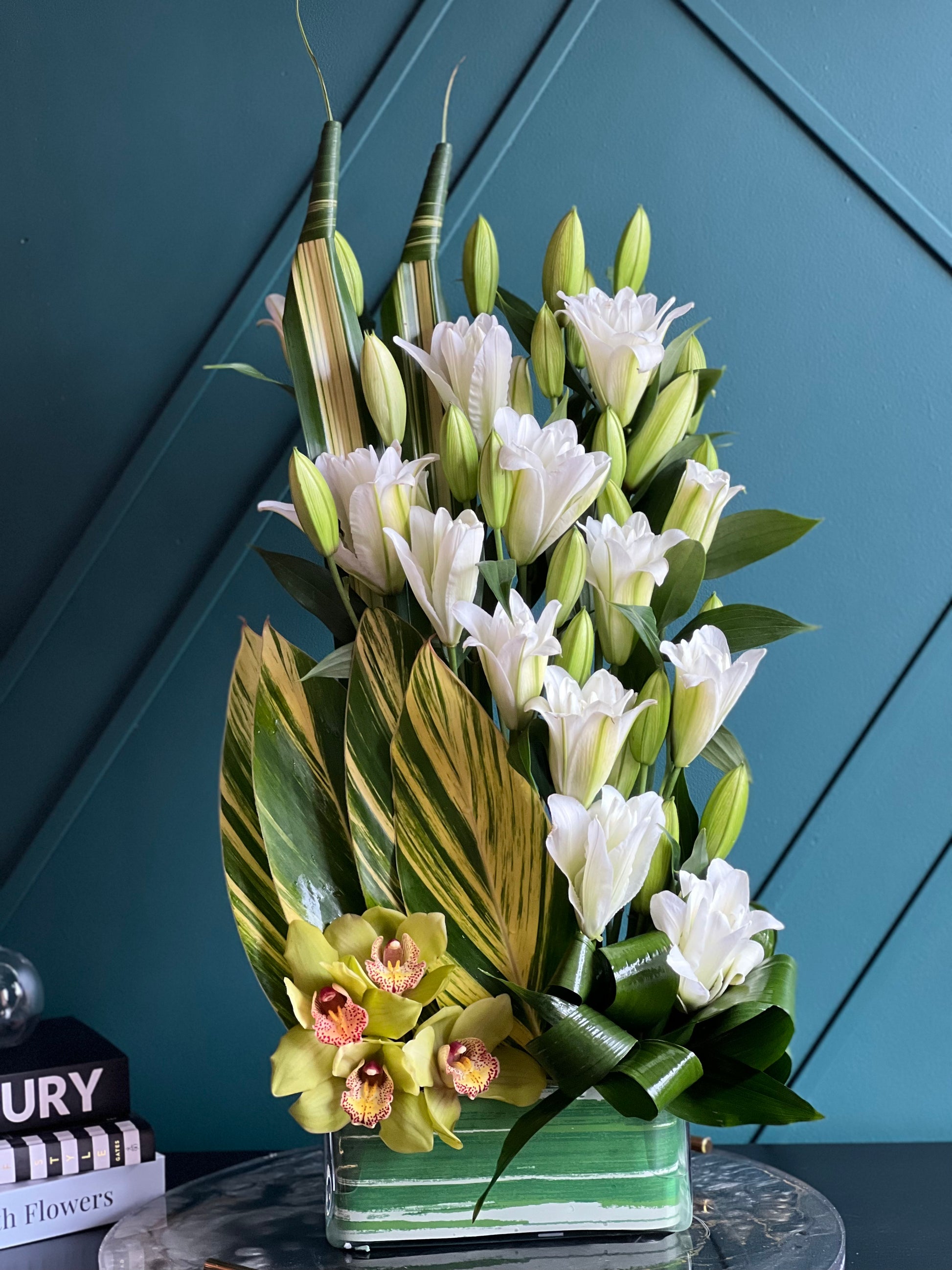 White lily and cymbidium orchid arrangement in Miami