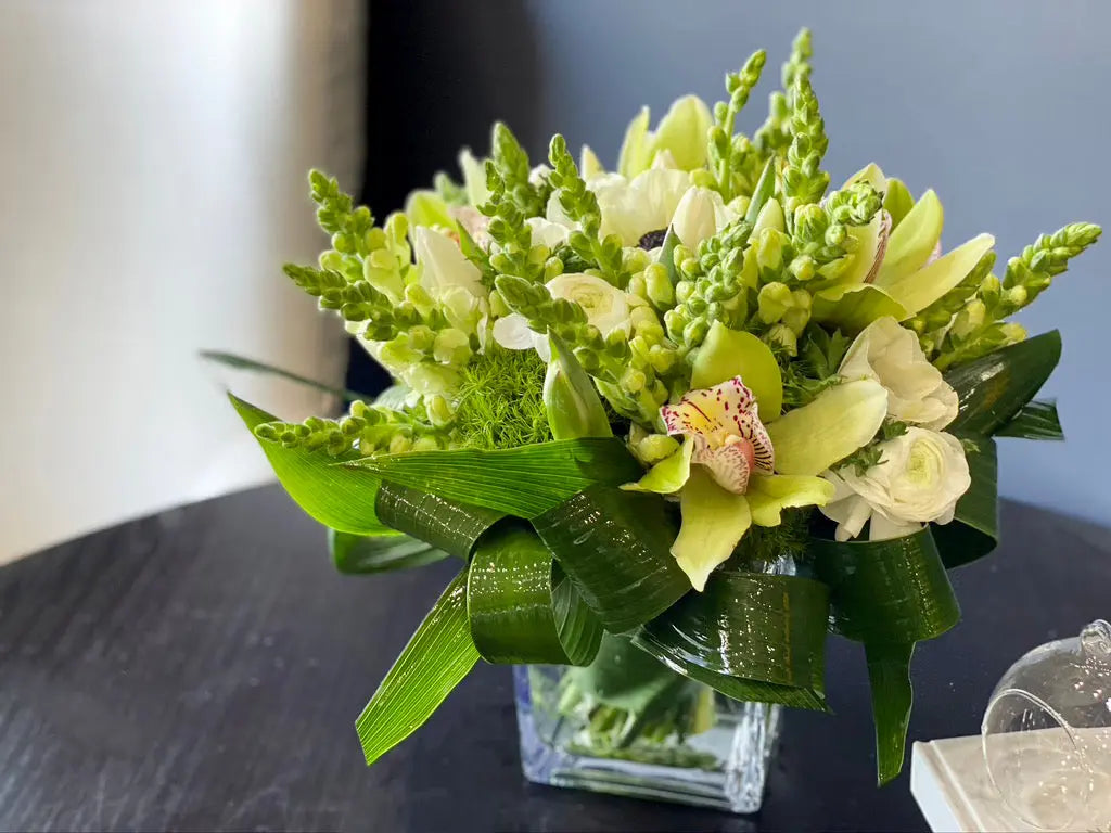 White orchid anemone and ranunculus flower arrangement Miami