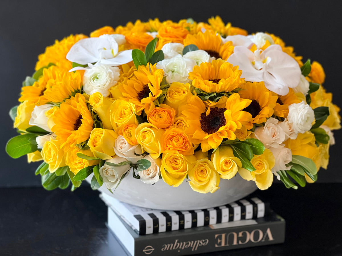 XXL yellow and white flower arrangement with sunflowers