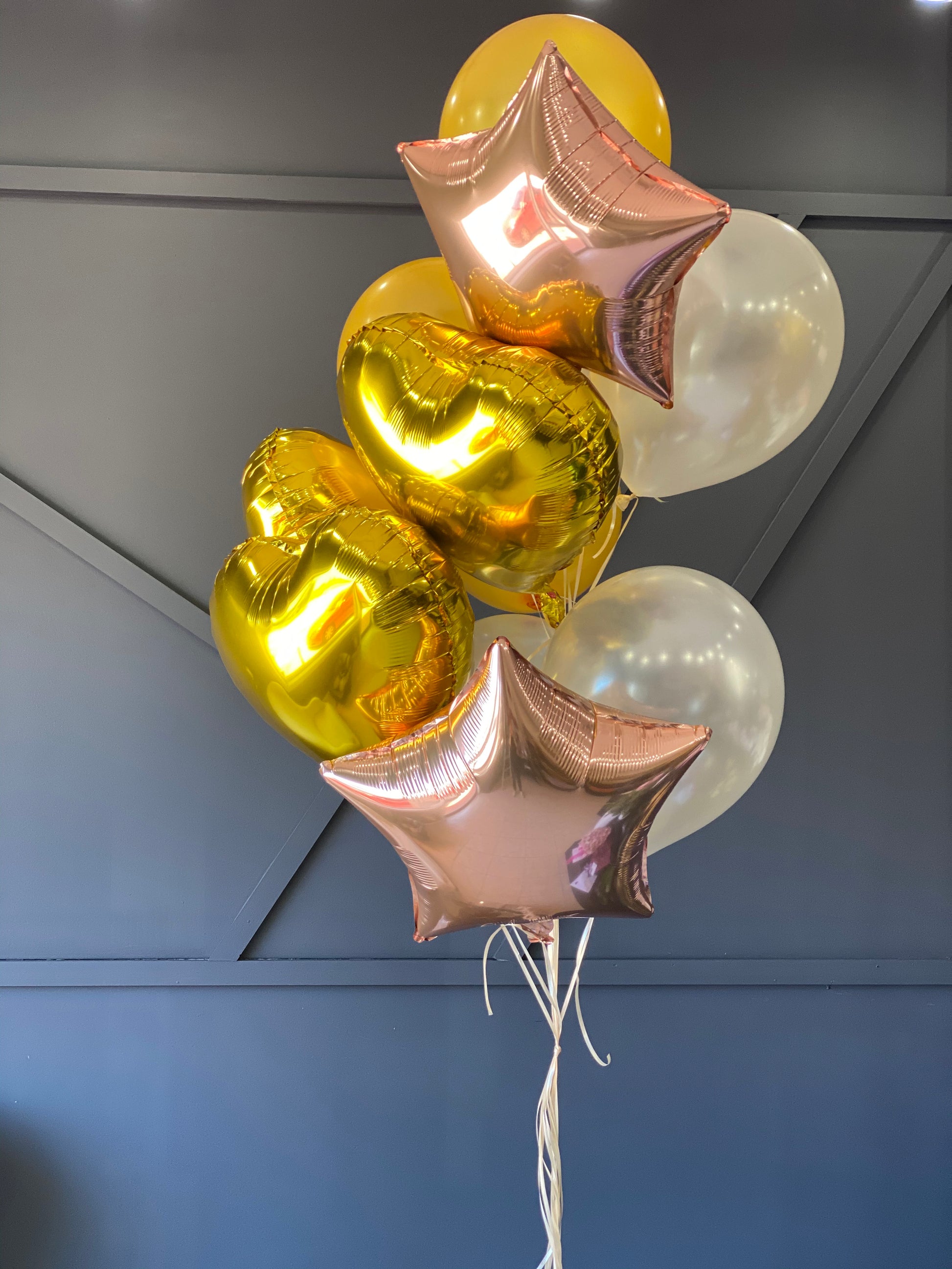 Yellow ivory gold and rose gold balloon bouquet by Luxury Flowers Miami