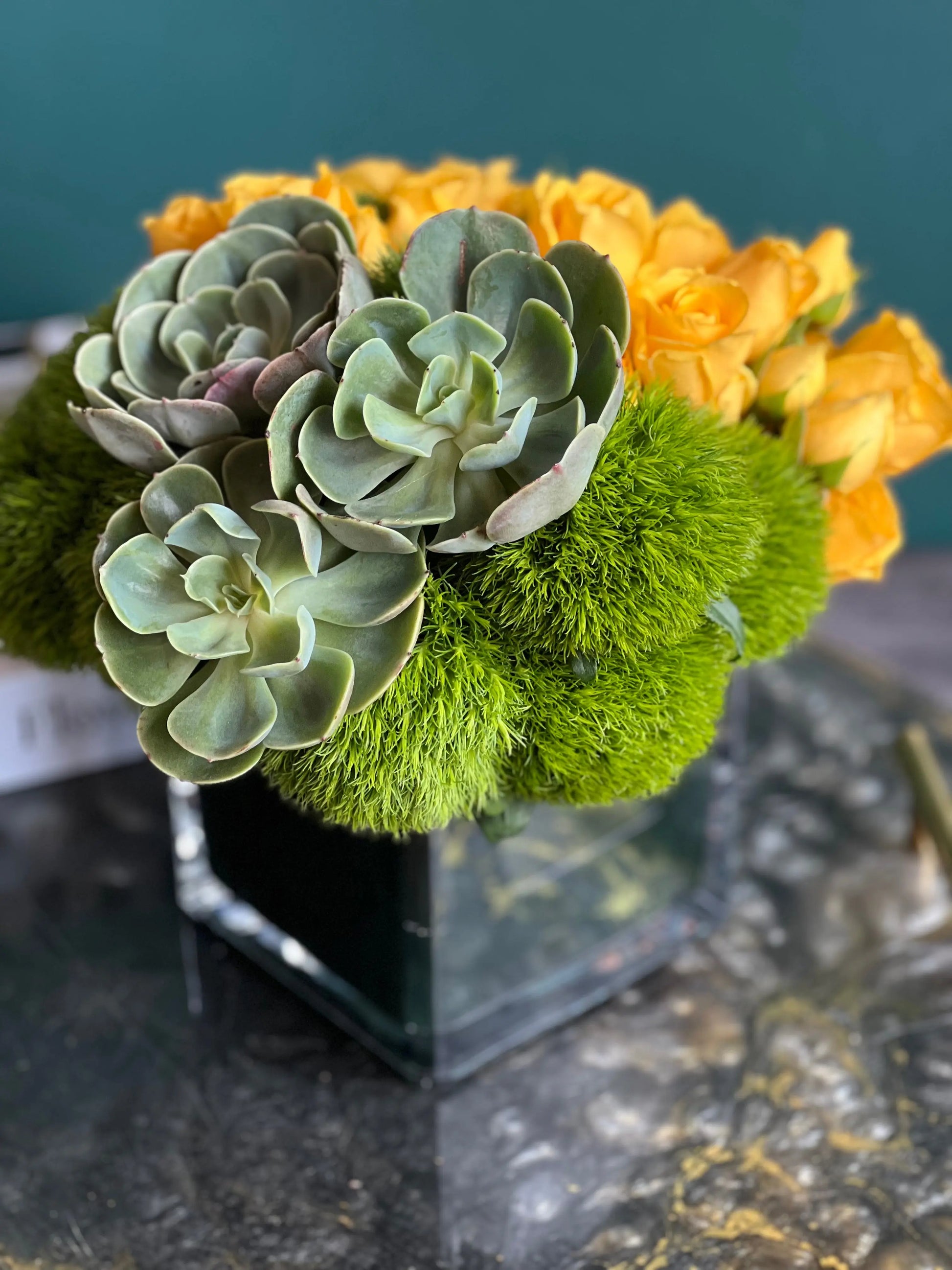 Yellow spray roses and succulents arrangement in Miami Beach
