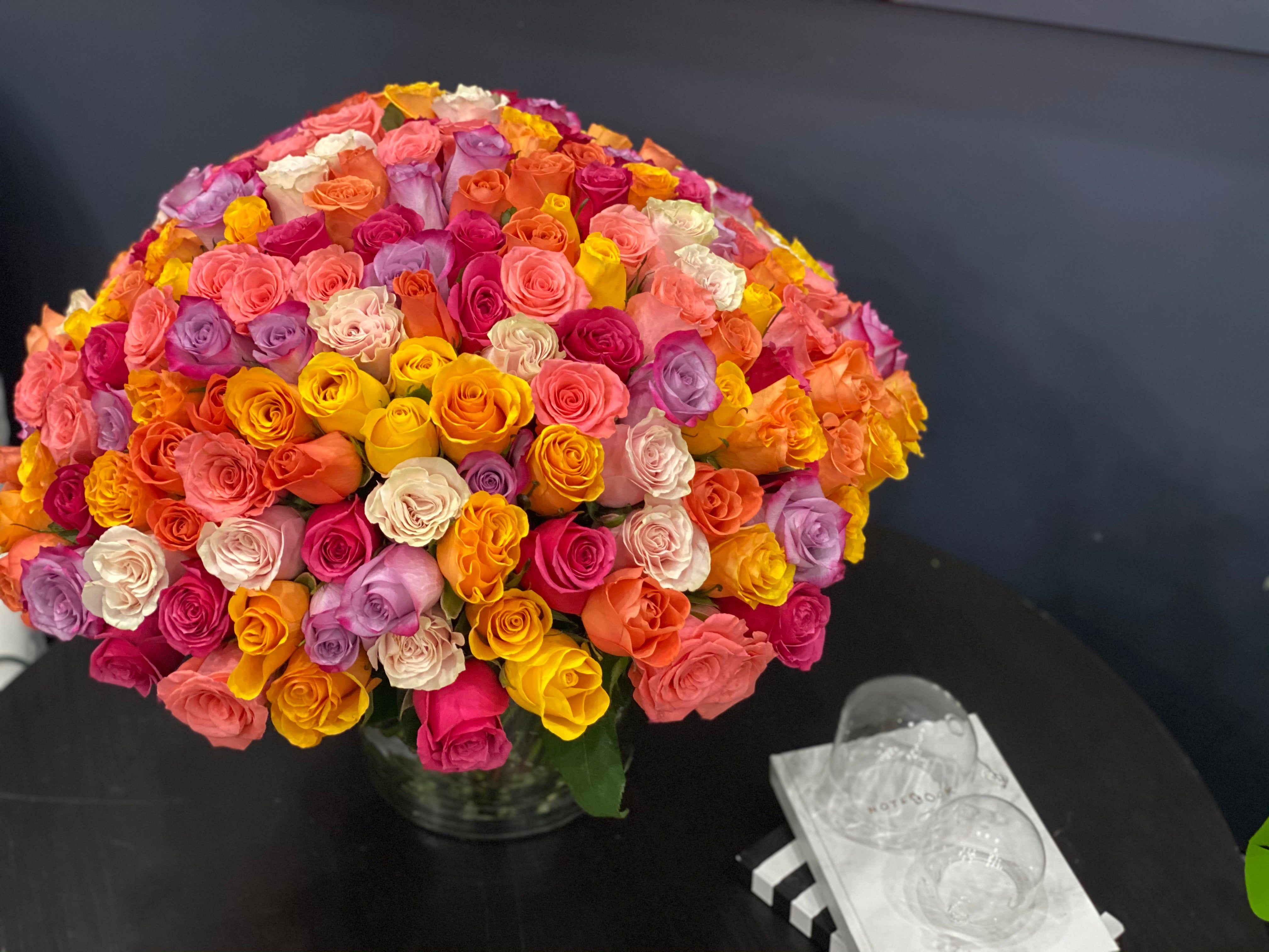 colorful 100 rose arrangement in vase Miami Beach