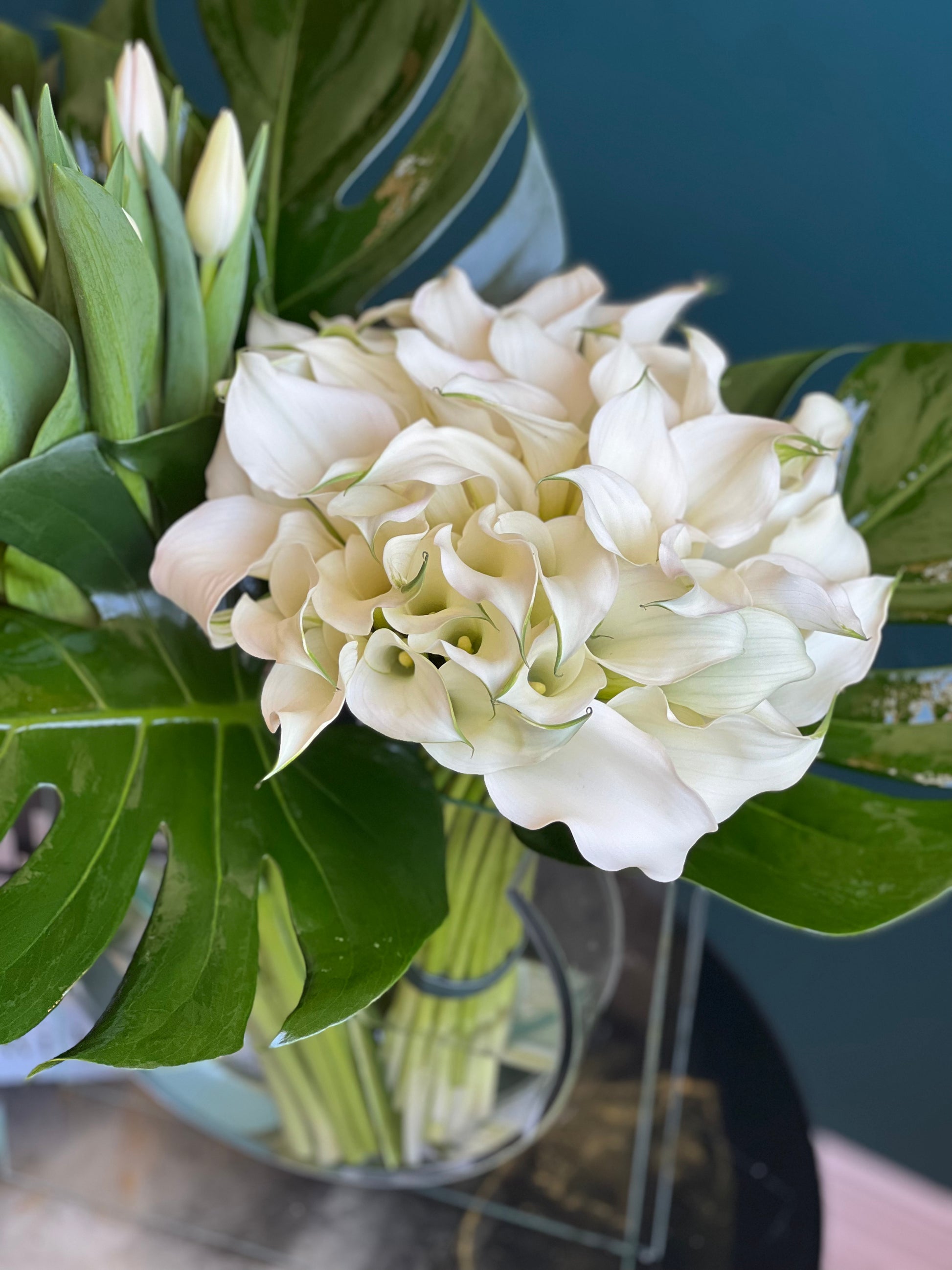 contemporary white flower arrangement by Luxury Flowers Miami