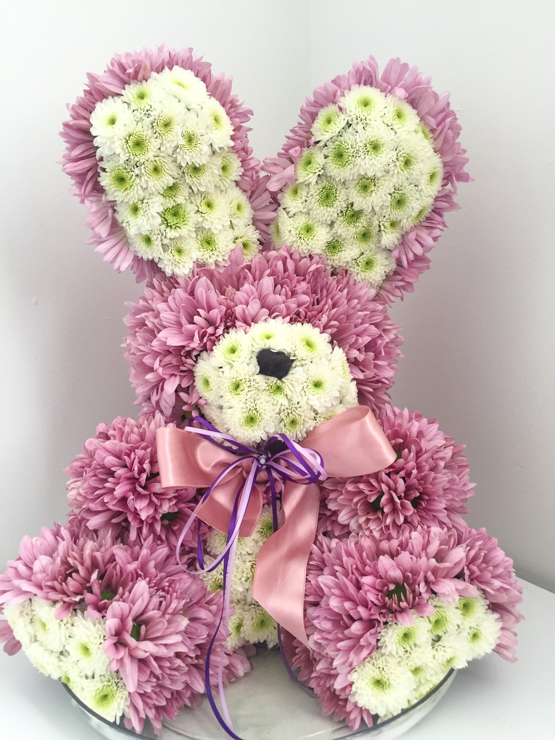 pink and white flower bunny with decorative ribbon