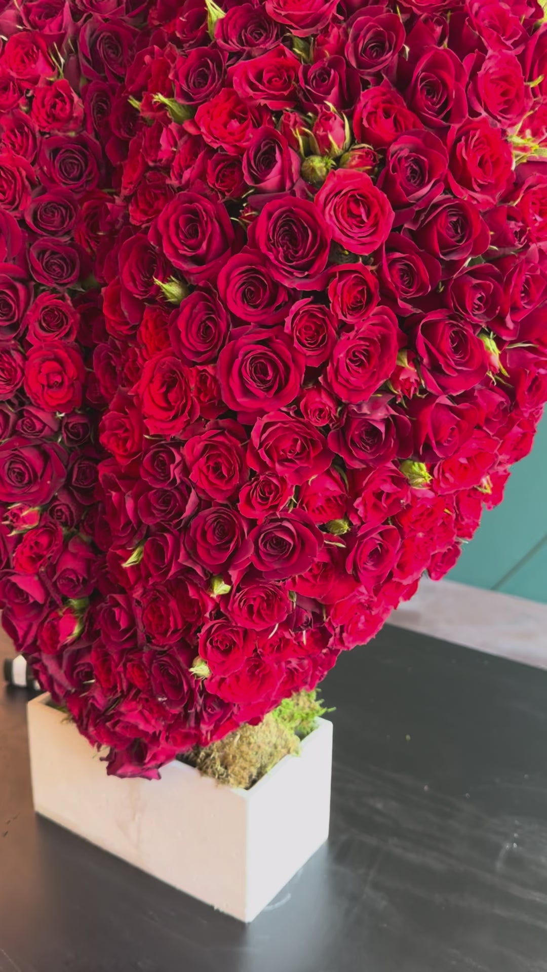 Load video: Handcrafted fresh flower heart with red roses Miami