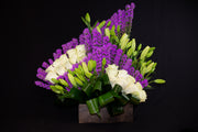 purple liatris white roses and lilies arrangement Miami