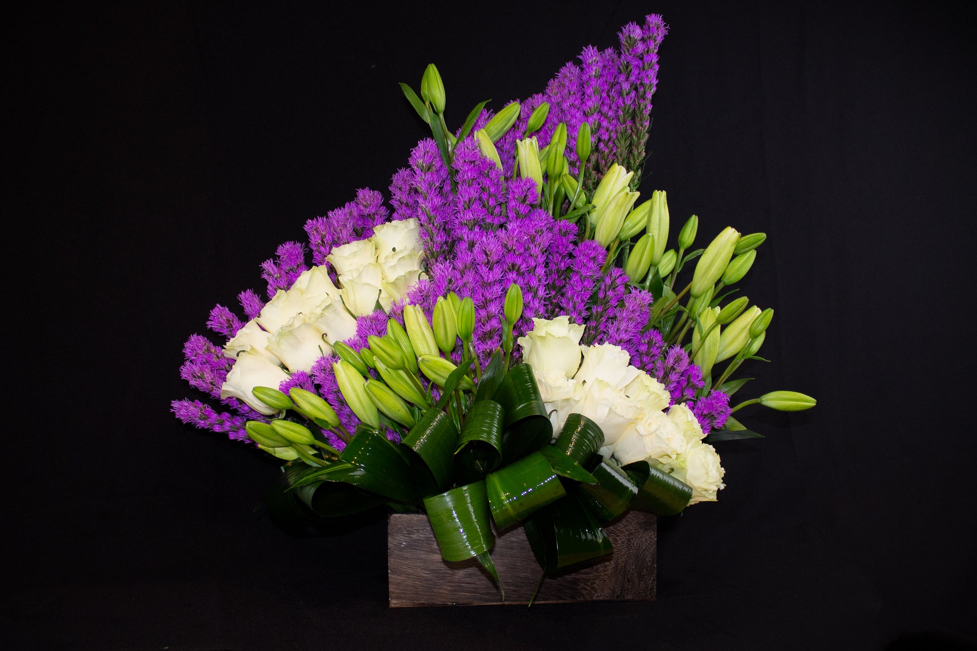 purple liatris white roses and lilies arrangement Miami